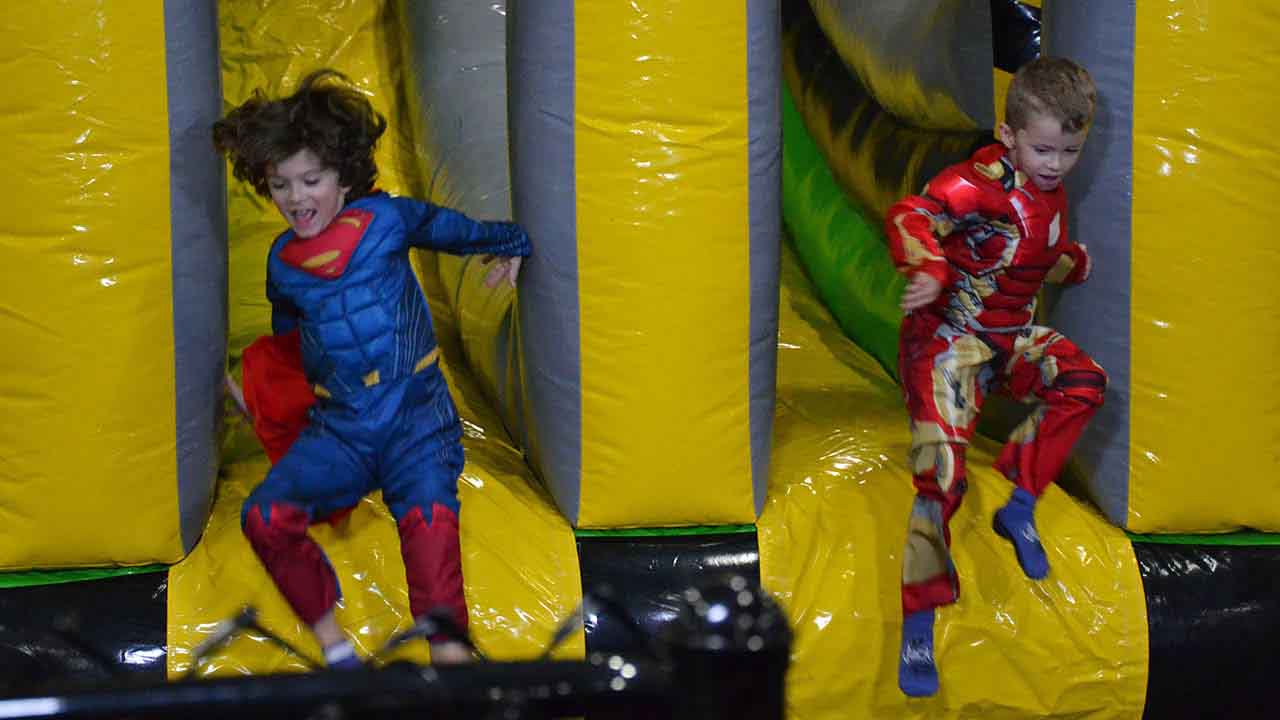 Comic book universes crossed as DC’s Superman and Marvel’s Ironman teamed up.