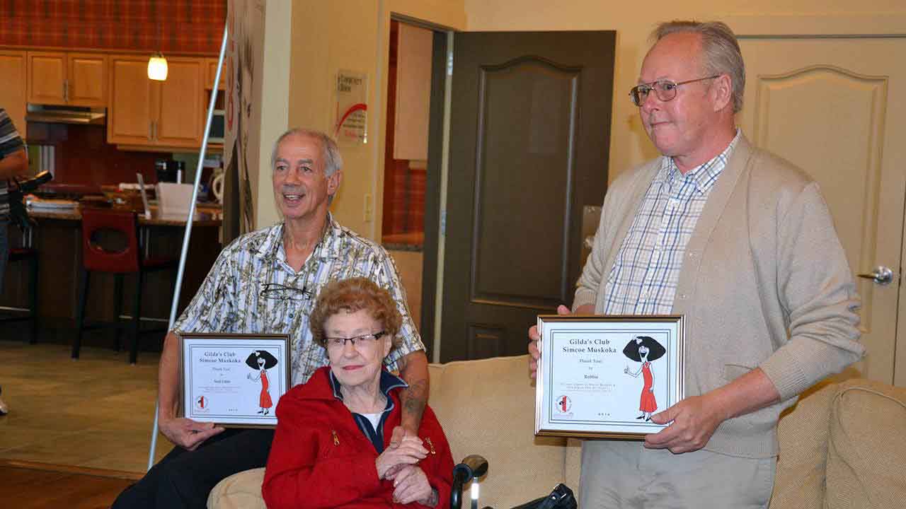 Neil and partner Paul with one of Gilda's longest supporters