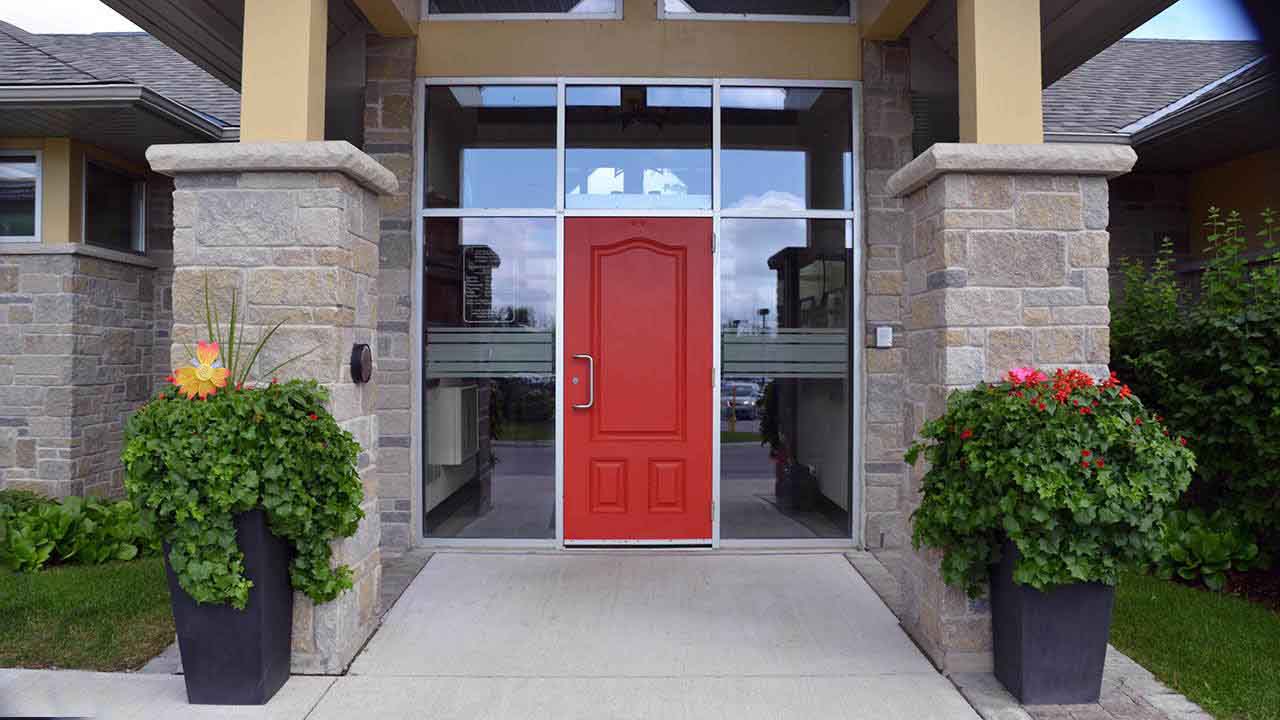 To hundreds of people each year this red door represents hope and support
