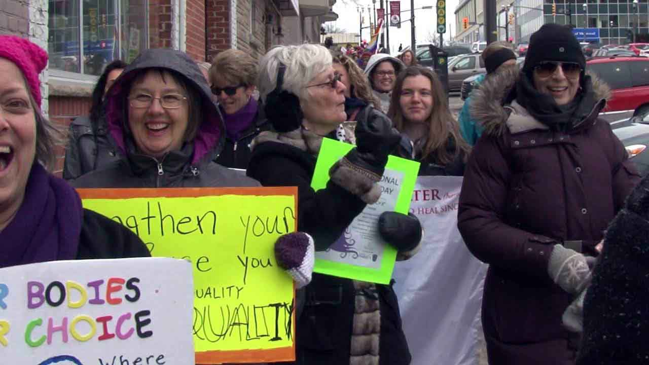 Then they walked through downtown along Dunlop