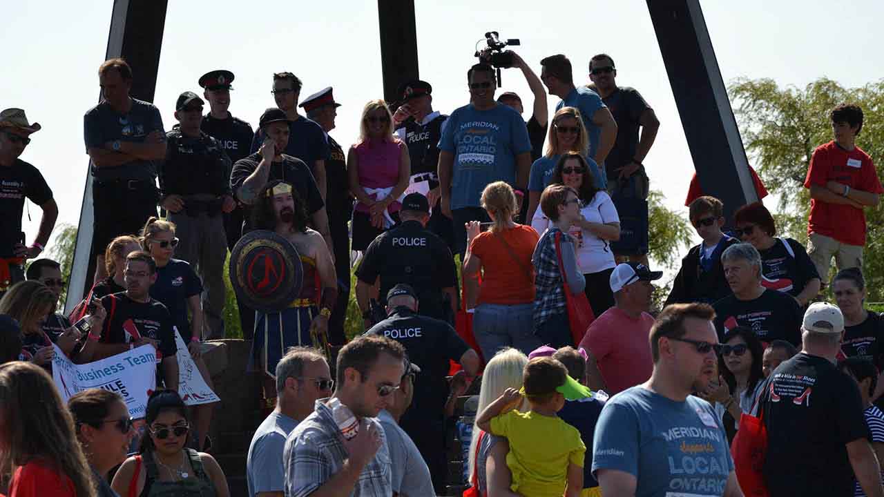 A group photo was called for under the Spirit Catcher.